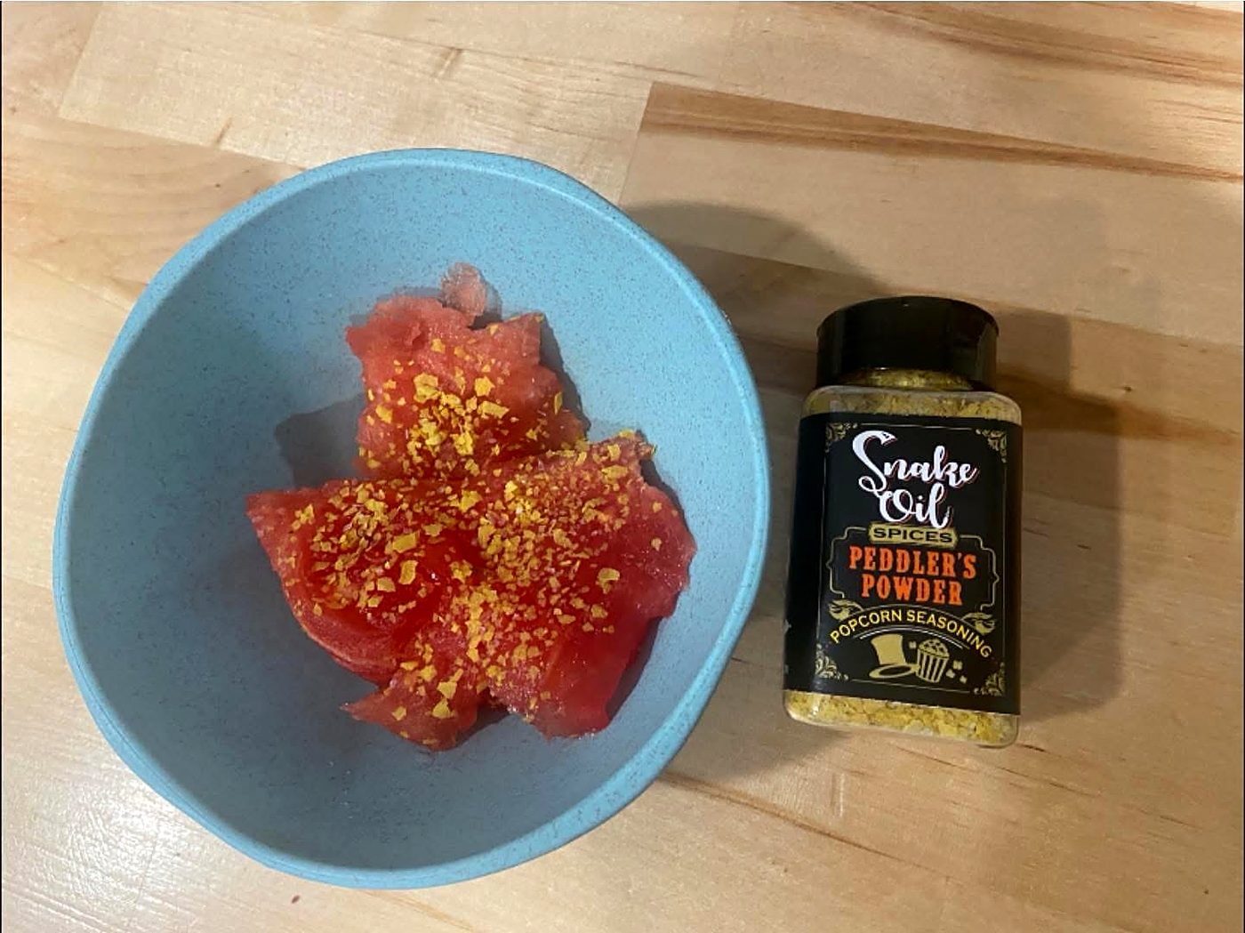 A bowl of fresh produce dusted with Peddler’s Powder